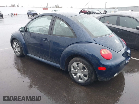 2003 Volkswagen New Beetle Coupe GL with VIN 3VWBK21C03M405877, listed as a IAAI auction lot 41851419 with 226,116 mi miles. Bid and sale history available at carsss.com. Image 3.