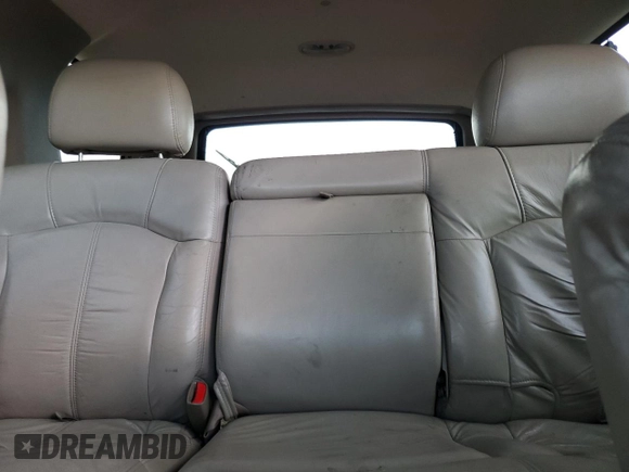 2001 Chevrolet Tahoe LT z VIN 1GNEK13TX1R176358, wystawiony jako Copart lot #56389115 z przebiegiem 241 898 mil mil oraz Szkoda całkowita • Salvage title. Historia ofert i sprzedaży dostępna na DreamBid. Obrazek 10.