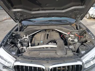 2018 BMW X5 xDrive35i with VIN 5UXKR0C50J0X92561, listed as a IAAI auction lot 41866445 with 56,918 mi miles. Bid and sale history available at carsss.com. Image 10.