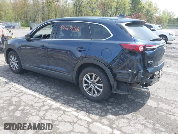 2019 Mazda CX-9 Touring z VIN JM3TCBCY6K0331905, wystawiony jako IAAI lot #42157842 z przebiegiem 84 211 mil mil oraz . Historia ofert i sprzedaży dostępna na DreamBid. Obrazek 3.