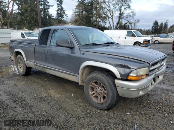 2003 Dodge Dakota SLT with VIN 1D7HL42X33S328572, listed as a Copart auction lot 43112125 with 0 mi miles and Salvage Title. Bid and sale history available at carsss.com. Image 4.