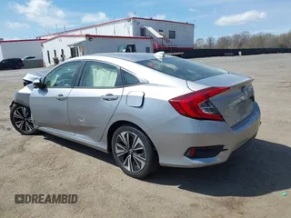 2018 Honda Civic EX-L with VIN JHMFC1F72JX043788, listed as a IAAI auction lot 41853131 with 137,266 mi miles and . Bid and sale history available at DreamBid. Image 3.