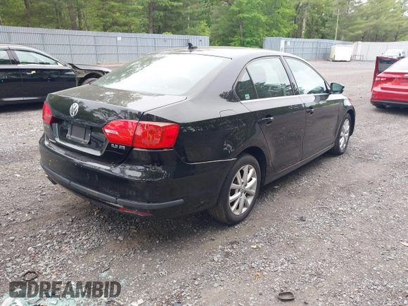 2013 Volkswagen Jetta SE with VIN 3VWDP7AJ7DM212911, listed as a IAAI auction lot 42307323 with 128,745 mi miles and . Bid and sale history available at DreamBid. Image 4.