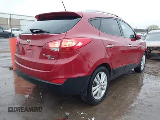 2013 Hyundai Tucson GLS with VIN KM8JU3AC8DU683546, listed as a IAAI auction lot 41956167 with 141,510 mi miles. Bid and sale history available at carsss.com. Image 4.