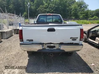 2000 Ford F-150 XL с VIN 1FTPF18L2YNA18807, выставлен на аукционе Copart как лот 62648305 с пробегом Не указан миль и Списание • Salvage title. История ставок и продаж доступна на DreamBid. Изображение 6.