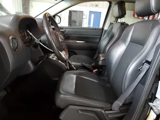 2016 Jeep Compass Latitude with VIN 1C4NJDEB2GD573909, listed as a Copart auction lot 62168225 with 70,944 mi miles and Salvage title. Bid and sale history available at DreamBid. Image 7.