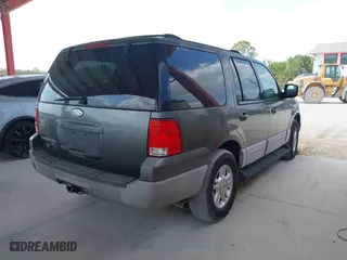 2003 Ford Expedition Special Service with VIN 1FMRU15W13LC32961, listed as a IAAI auction lot 42100080 with 126,047 mi miles. Bid and sale history available at carsss.com. Image 4.