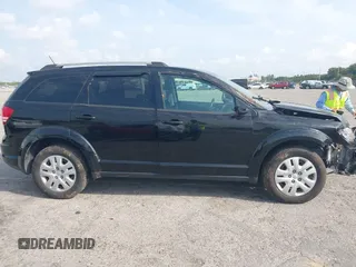 2017 Dodge Journey SE with VIN 3C4PDCAB4HT691343, listed as a IAAI auction lot 41863725 with 99,519 mi miles and . Bid and sale history available at carsss.com. Image 13.