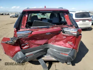 2024 Toyota RAV4 Hybrid XLE Premium with VIN JTMB6RFVXRD120389, listed as a Copart auction lot 47596985 with 16,956 mi miles and Salvage Title. Bid and sale history available at DreamBid. Image 6.