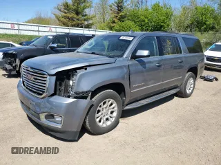 2019 GMC Yukon XL SLT z VIN 1GKS2GKCXKR273484, wystawiony jako Copart lot #56195705 z przebiegiem 87 948 mil mil oraz Czysty tytuł • Clean title. Historia ofert i sprzedaży dostępna na DreamBid. Obrazek 1.