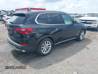 2020 BMW X5 xDrive40i with VIN 5UXCR6C04L9D63551, listed as a IAAI auction lot 42505561 with 56,763 mi miles and . Bid and sale history available at DreamBid. Image 4.