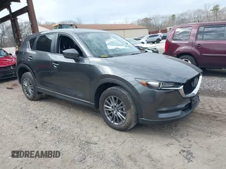 2021 Mazda CX-5 Touring with VIN JM3KFBCM8M0492145, listed as a IAAI auction lot 39077248 with 20,408 mi miles. Bid and sale history available at carsss.com. Image 1.