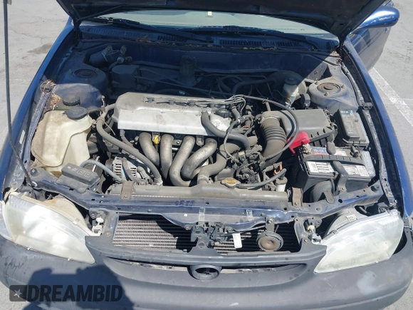 1998 Toyota Corolla VE z VIN 2T1BR18E4WC099280, wystawiony jako IAAI lot #42624278 z przebiegiem 129 901 mil mil oraz . Historia ofert i sprzedaży dostępna na DreamBid. Obrazek 10.