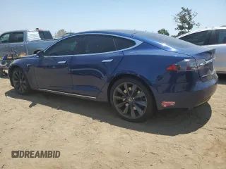 2018 Tesla Model S 75D with VIN 5YJSA1E25JF249743, listed as a Copart auction lot 59636235 with 101,275 mi miles and Salvage title. Bid and sale history available at DreamBid. Image 2.