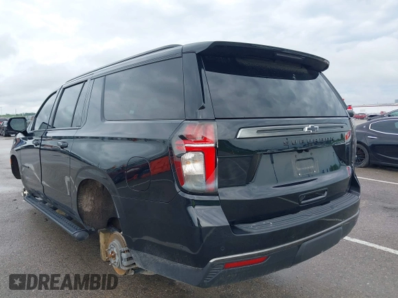 2022 Chevrolet Suburban Z71 with VIN 1GNSKDKD7NR151681, listed as a IAAI auction lot 41991670 with 57,090 mi miles and . Bid and sale history available at DreamBid. Image 3.
