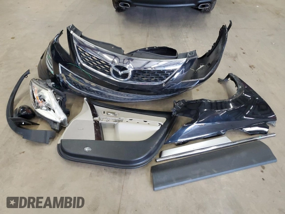 2012 Mazda CX-9 Grand Touring with VIN JM3TB2DA8C0352597, listed as a Copart auction lot 50084505 with 88,331 mi miles and Salvage Title. Bid and sale history available at DreamBid. Image 13.