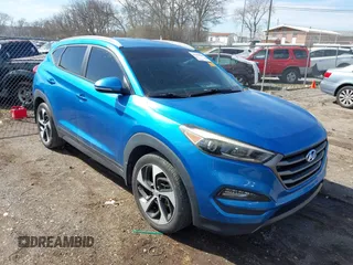 2016 Hyundai Tucson Sport with VIN KM8J33A26GU036237, listed as a IAAI auction lot 41658889 with 117,941 mi miles. Bid and sale history available at carsss.com. Image 1.