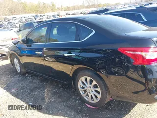 2019 Nissan Sentra S with VIN 3N1AB7AP8KY415002, listed as a IAAI auction lot 41772857 with 95,898 mi miles and . Bid and sale history available at DreamBid. Image 14.