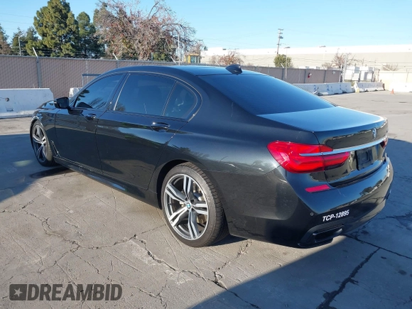 2018 BMW 7 Series 750i with VIN WBA7F0C50JGM24160, listed as a IAAI auction lot 41448519 with 138,742 mi miles. Bid and sale history available at carsss.com. Image 3.
