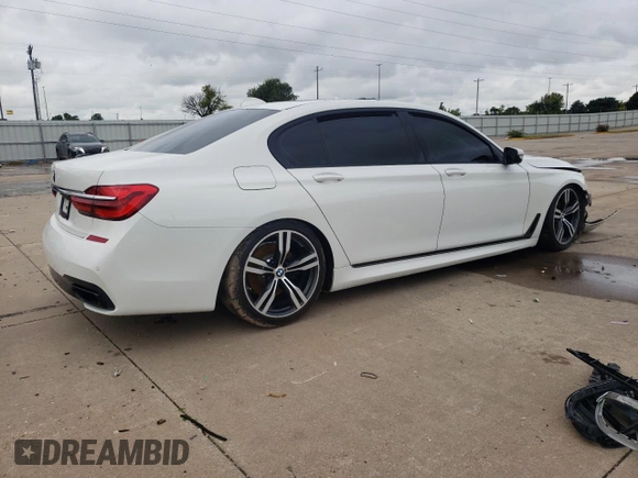 2016 BMW 7 Series 740i with VIN WBA7E2C53GG739056, listed as a Copart auction lot 59141613 with 0 mi miles. Bid and sale history available at carsss.com. Image 3.