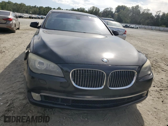 2011 BMW 7 Series with VIN WBAKX8C52BC198377, listed as a Copart auction lot 70003444 with 173,725 mi miles and Salvage title. Bid and sale history available at DreamBid. Image 5.