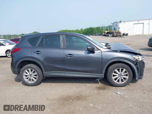2016 Mazda CX-5 Sport with VIN JM3KE4BY7G0893984, listed as a IAAI auction lot 42479813 with Not provided miles and . Bid and sale history available at DreamBid. Image 14.
