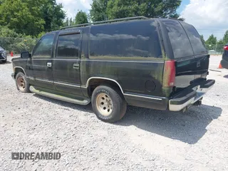 1996 Chevrolet Suburban with VIN 3GNEC16R3TG120004, listed as a IAAI auction lot 42752410 with 291,491 mi miles and . Bid and sale history available at DreamBid. Image 3.
