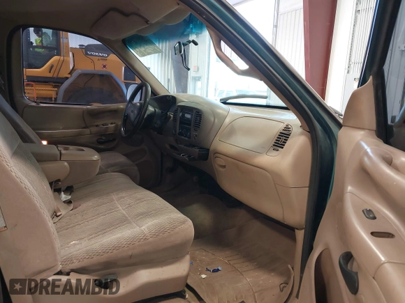 1997 Ford F-150 z VIN 1FTEF18L3VKC01590, wystawiony jako IAAI lot #41807198 z przebiegiem 210 000 mil mil oraz . Historia ofert i sprzedaży dostępna na DreamBid. Obrazek 5.