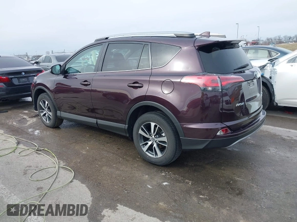 2018 Toyota RAV4 XLE with VIN 2T3RFREV6JW857693, listed as a IAAI auction lot 41541902 with 62,415 mi miles. Bid and sale history available at carsss.com. Image 3.