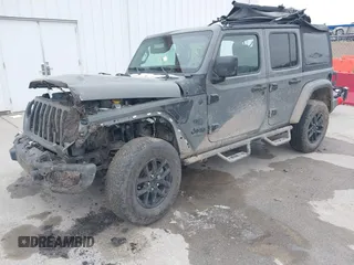 2023 Jeep Wrangler Willys with VIN 1C4HJXDN1PW596046, listed as a IAAI auction lot 41580875 with 48,451 mi miles and . Bid and sale history available at DreamBid. Image 2.