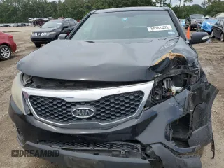 2011 Kia Sorento EX z VIN 5XYKU4A28BG025617, wystawiony jako Copart lot #54141405 z przebiegiem 151 066 mil mil oraz Szkoda całkowita • Salvage title. Historia ofert i sprzedaży dostępna na DreamBid. Obrazek 5.
