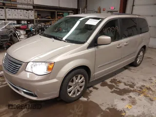 2013 Chrysler Town & Country Touring with VIN 2C4RC1BG5DR731002, listed as a IAAI auction lot 41575003 with 106,486 mi miles. Bid and sale history available at carsss.com. Image 2.