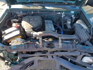 1996 Nissan Frontier XE with VIN 1N6SD16Y9TC338402, listed as a Copart auction lot 45058765 with 164,295 mi miles and Salvage title. Bid and sale history available at DreamBid. Image 12.