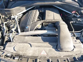 2015 BMW X5 xDrive35i with VIN 5UXKR0C53F0K62348, listed as a IAAI auction lot 41969164 with 122,612 mi miles. Bid and sale history available at carsss.com. Image 10.