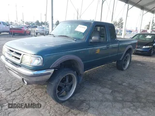 1997 Ford Ranger XLT with VIN 1FTDR15X5VPA65640, listed as a IAAI auction lot 41436818 with 212,661 mi miles. Bid and sale history available at carsss.com. Image 18.