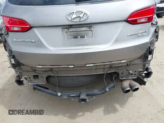 2015 Hyundai Santa Fe z VIN 5XYZW4LA9FG283826, wystawiony jako IAAI lot #42289253 z przebiegiem 120 369 mil mil oraz . Historia ofert i sprzedaży dostępna na DreamBid. Obrazek 6.