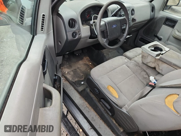 2005 Ford F-150 STX with VIN 1FTRX12W55FB32573, listed as a Copart auction lot 59602715 with 238,701 mi miles and Salvage title. Bid and sale history available at DreamBid. Image 8.