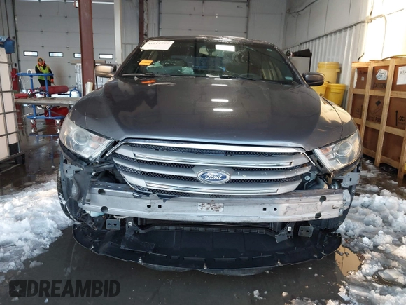 2013 Ford Taurus SEL z VIN 1FAHP2E89DG150197, wystawiony jako IAAI lot #41214999 z przebiegiem 146 307 mil mil oraz . Historia ofert i sprzedaży dostępna na DreamBid. Obrazek 6.