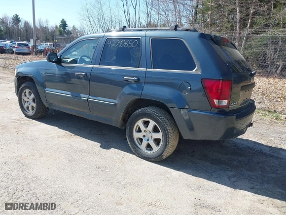 2008 Jeep Grand Cherokee Laredo with VIN 1J8GR48K98C161239, listed as a IAAI auction lot 42090850 with 218,063 mi miles. Bid and sale history available at carsss.com. Image 3.