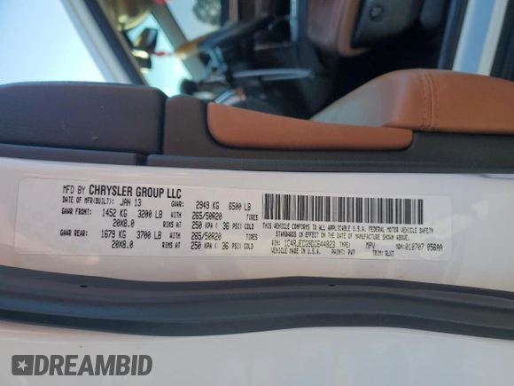 2013 Jeep Grand Cherokee Overland with VIN 1C4RJECG9DC644823, listed as a Copart auction lot 83232414 with 193,205 mi miles and Salvage Title. Bid and sale history available at carsss.com. Image 14.