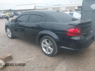 2014 Dodge Avenger SE with VIN 1C3CDZAB2EN229221, listed as a IAAI auction lot 42632298 with 163,229 mi miles and . Bid and sale history available at DreamBid. Image 3.