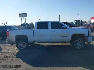 2016 Chevrolet Silverado 1500 LT with VIN 3GCUKREC6GG306239, listed as a IAAI auction lot 41380251 with 128,042 mi miles. Bid and sale history available at carsss.com. Image 14.