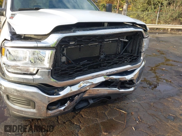2021 Ram 2500 Tradesman with VIN 3C6UR5HL0MG648241, listed as a IAAI auction lot 40782479 with 57,033 mi miles and . Bid and sale history available at DreamBid. Image 6.