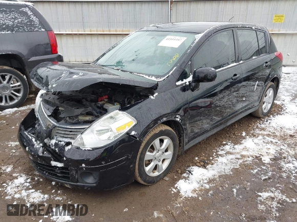 2009 Nissan Versa 1.8 SL with VIN 3N1BC13E49L427102, listed as a IAAI auction lot 41553357 with 133,300 mi miles. Bid and sale history available at carsss.com. Image 2.