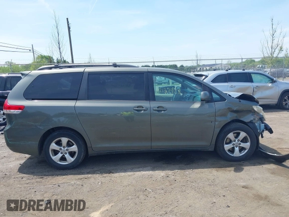 2011 Toyota Sienna LE AAS with VIN 5TDKK3DC7BS014356, listed as a IAAI auction lot 42137928 with 198,400 mi miles and . Bid and sale history available at DreamBid. Image 13.