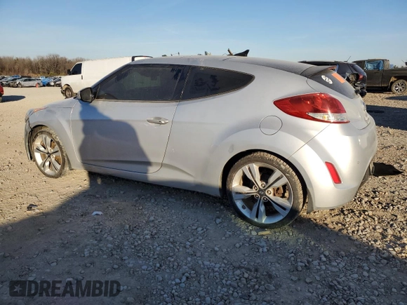 2012 Hyundai Veloster w/Gray Int с VIN KMHTC6AD2CU050738, выставлен на аукционе Copart как лот 42136435 с пробегом 151 482 миль миль и Списание • Salvage title. История ставок и продаж доступна на DreamBid. Изображение 2.