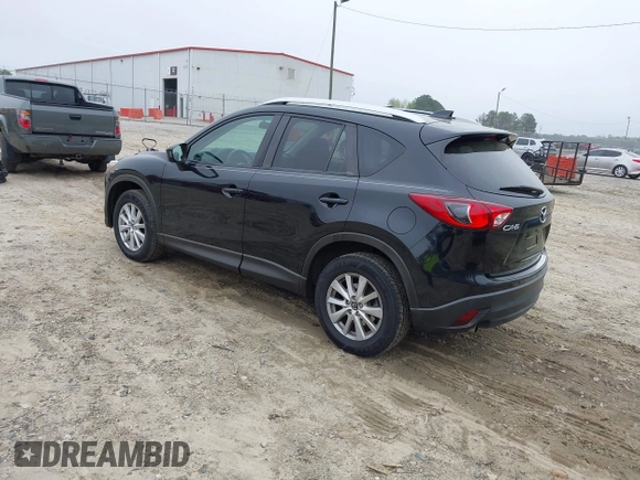 2014 Mazda CX-5 Touring with VIN JM3KE2CY7E0341658, listed as a IAAI auction lot 41915807 with 99,287 mi miles. Bid and sale history available at carsss.com. Image 3.