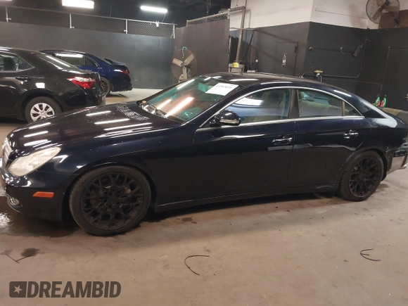 2007 Mercedes-Benz CLS-Class 5.5L with VIN WDDDJ72X77A106148, listed as a IAAI auction lot 41993651 with 158,291 mi miles. Bid and sale history available at carsss.com. Image 15.