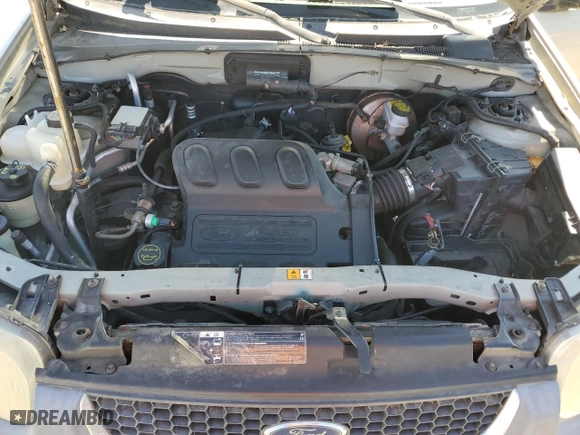 2004 Ford Escape XLT with VIN 1FMYU03104KA53587, listed as a Copart auction lot 51777385 with 154,102 mi miles and Salvage Title. Bid and sale history available at carsss.com. Image 12.