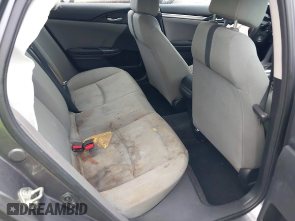 2019 Honda Civic LX with VIN 19XFC2F68KE007409, listed as a IAAI auction lot 41887406 with 57,147 mi miles and . Bid and sale history available at DreamBid. Image 8.